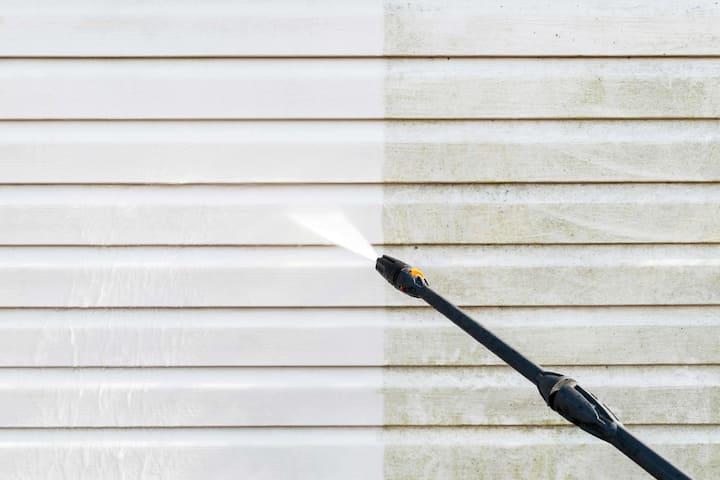 Residential exterior power washing in Austin, TX: Before and after transformation.